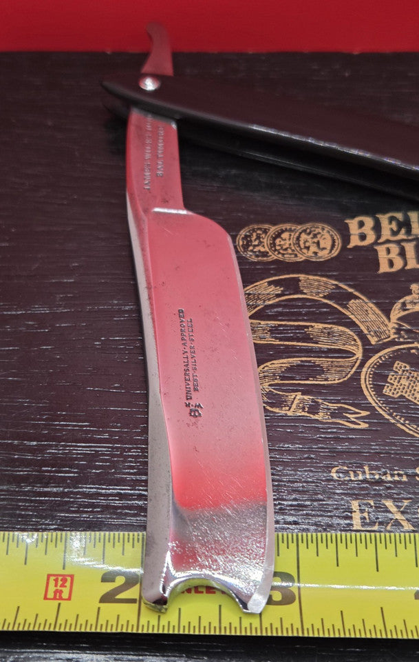 7/8 James-Wilks-June. Crown WR. Silver Steel Straight Razor.